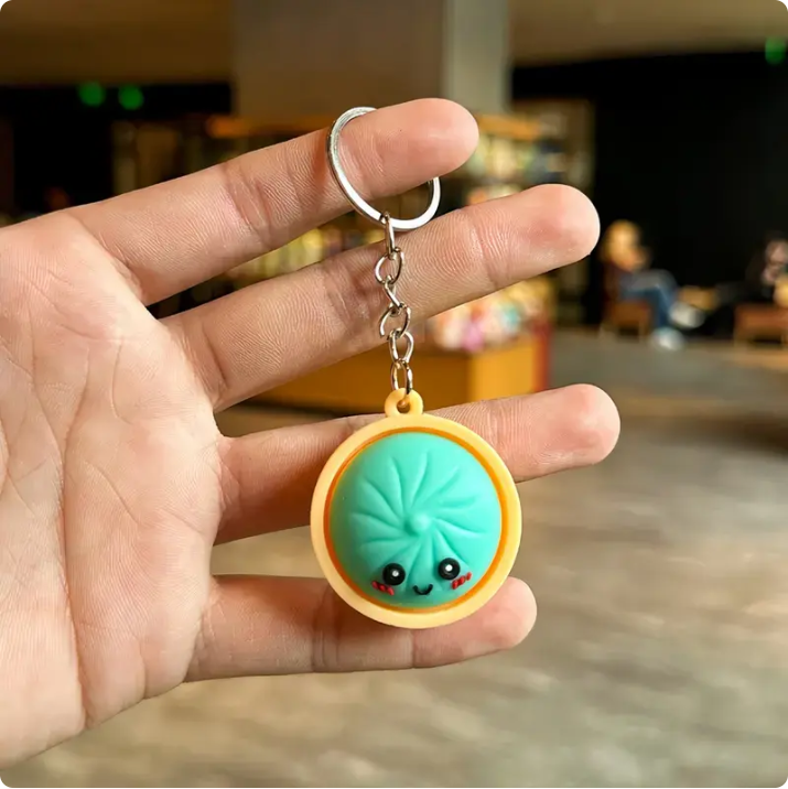Squeeze Away Stress with theLight-Up Dumpling FidgetKeychain!