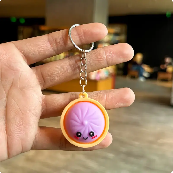 Squeeze Away Stress with theLight-Up Dumpling FidgetKeychain!