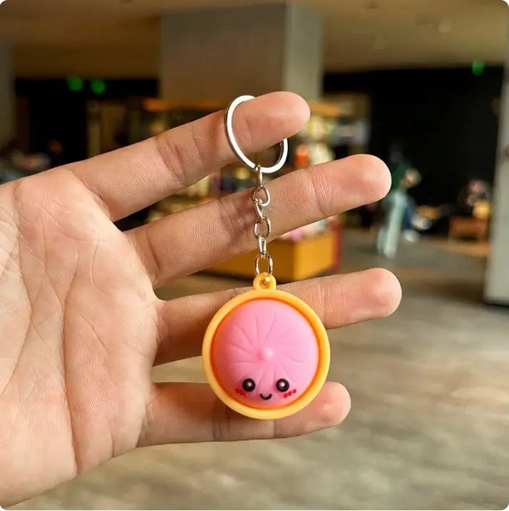Squeeze Away Stress with theLight-Up Dumpling FidgetKeychain!